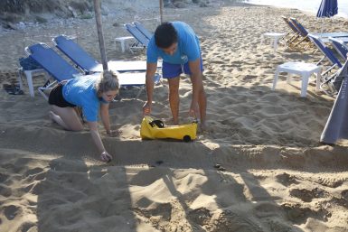Volunteers on beach in Greece