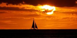 Sailing boat at sunset