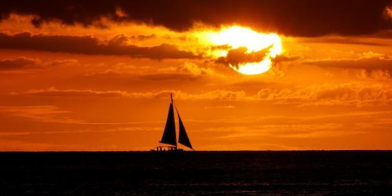 Sailing boat at sunset
