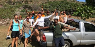 Conservation Volunteers with truck in Caribbean