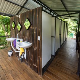 Open platform with sinks and showers in closed space