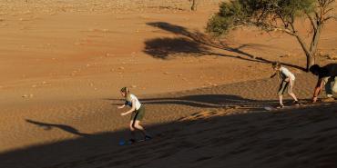 Sand boarding in Kanaan in Namibia