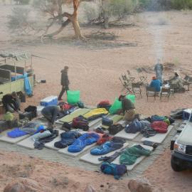 Family volunteering group sleeping out under stars in Namibia