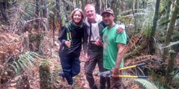 Conservation volunteers in New Zealand forest