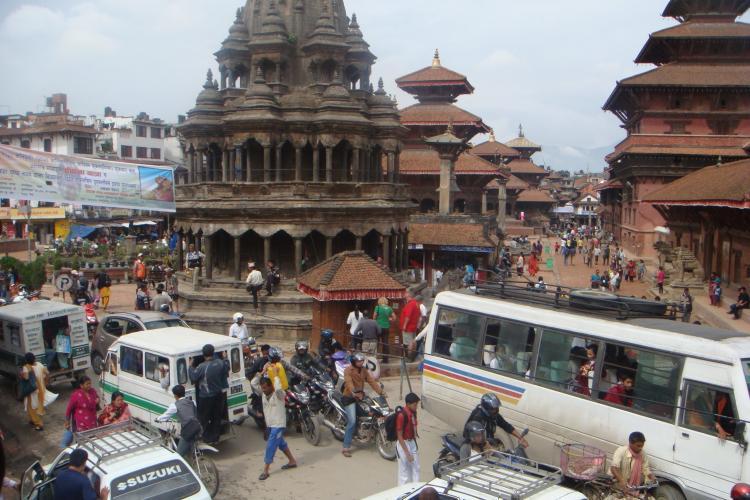 Volunteer walk down Busy street in Kathmandu