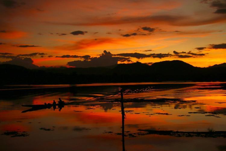 Sunset by river in Laos
