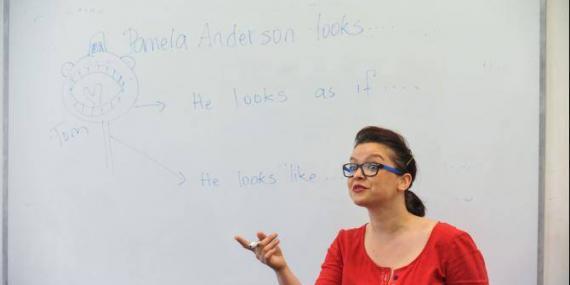 TEFL teacher giving class