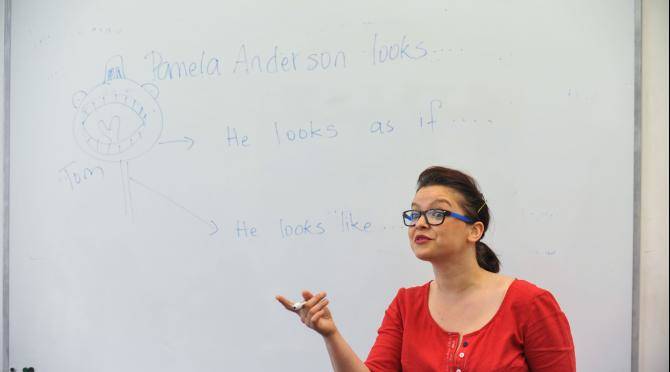 TEFL teacher giving class