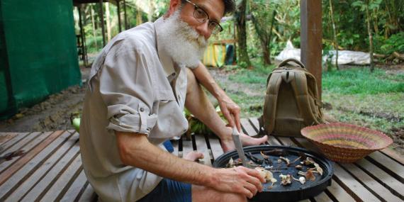 Volunteer with mushrooms