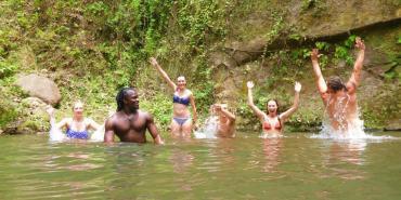 Volunteers at waterfall in Grenada