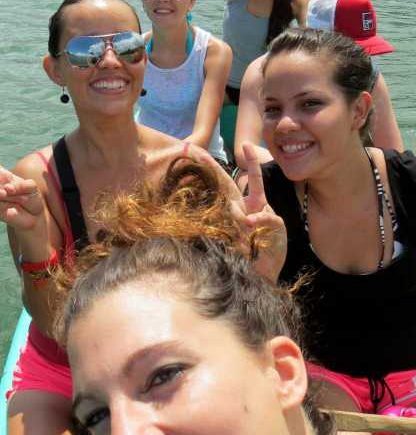 Volunteers crossing on a boat