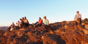 Volunteers hiking in Kanaan Desert in Namibia