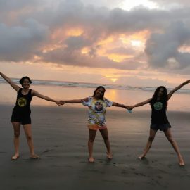 Three volunteers enjoying Hermosa sunrise