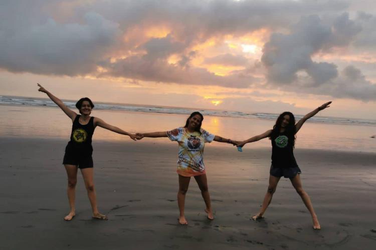 Three volunteers enjoying Hermosa sunrise