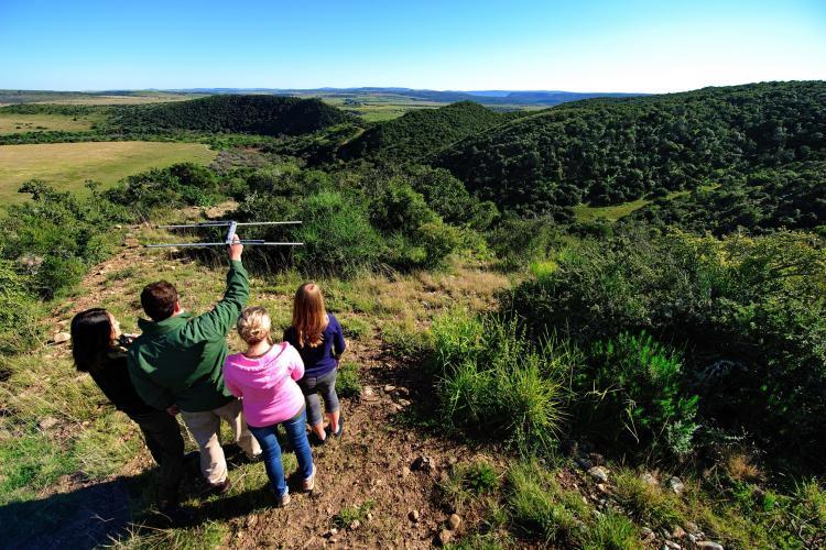 Volunteers learn to track carnivores with telemetry at Shamwari