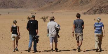 Volunteers walking in the Namib desert