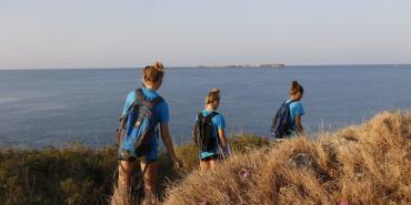 Volunteers walking in Greece