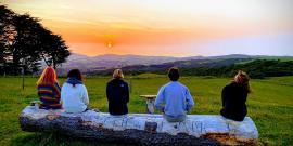 Volunteers watching sunset in New Zealand