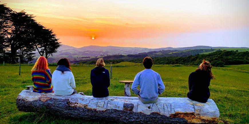 Volunteers watching sunset in New Zealand
