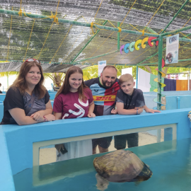 Maldives sea turtle family volunteering